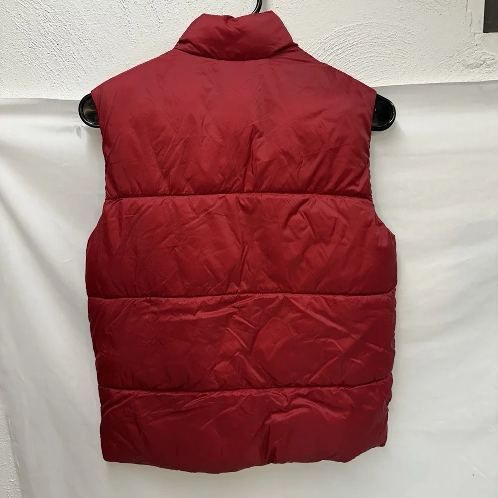 Old Navy Water-Resistant Puffer Vest Youth L Red with blue fleece‎ lining.